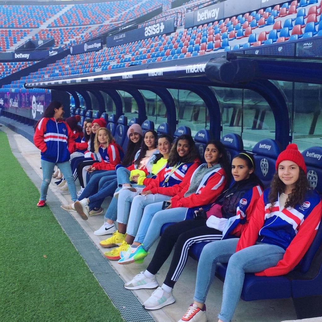 SFI players in the dugout at a European stadium